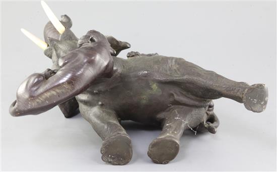 A large Japanese bronze group of tigers attacking an elephant, Meiji period, height 39cm length 31cm